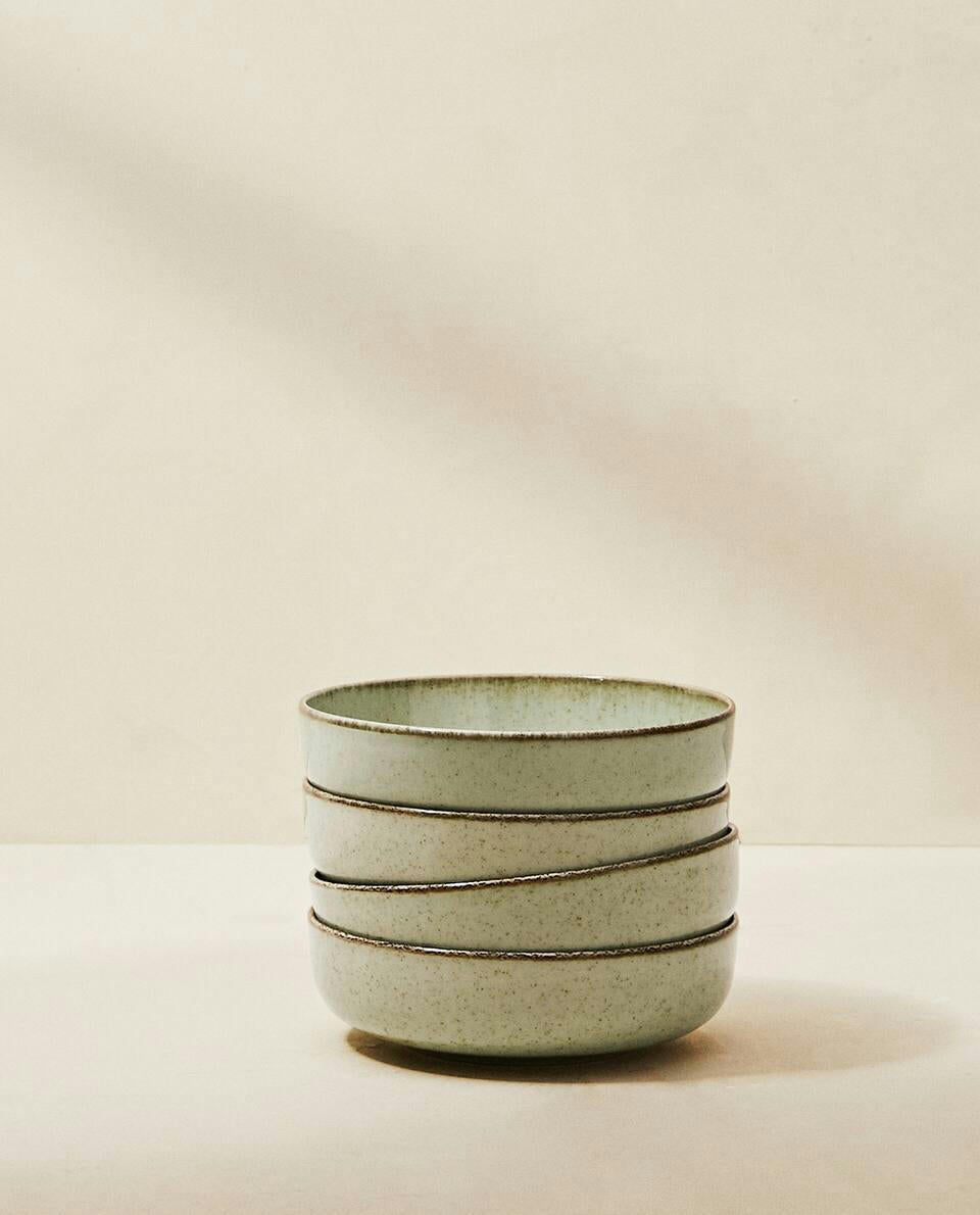 PORCELAIN BOWL WITH ANTIQUE FINISH RIM
