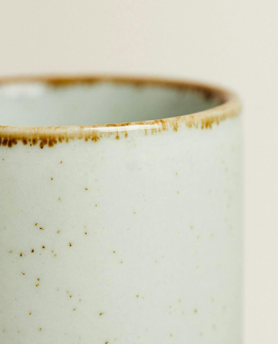 PORCELAIN MUG WITH ANTIQUE FINISH RIM
