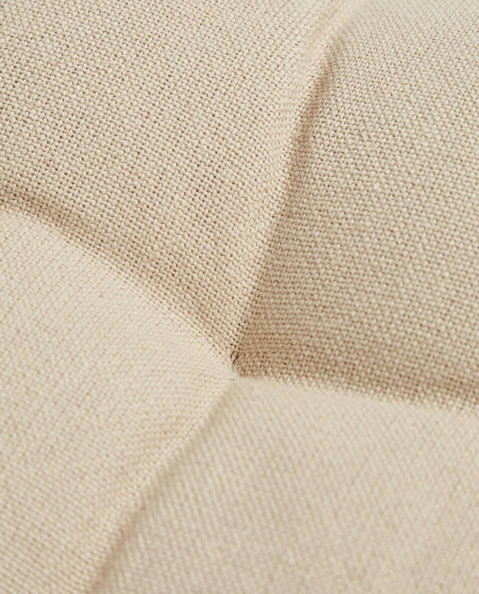QUILTED CHAIR CUSHION WITH TIES