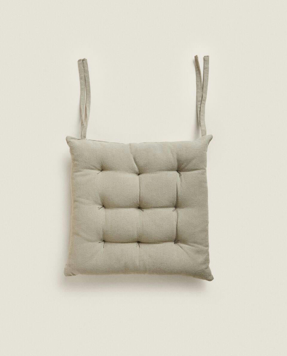 QUILTED CHAIR CUSHION WITH TIES