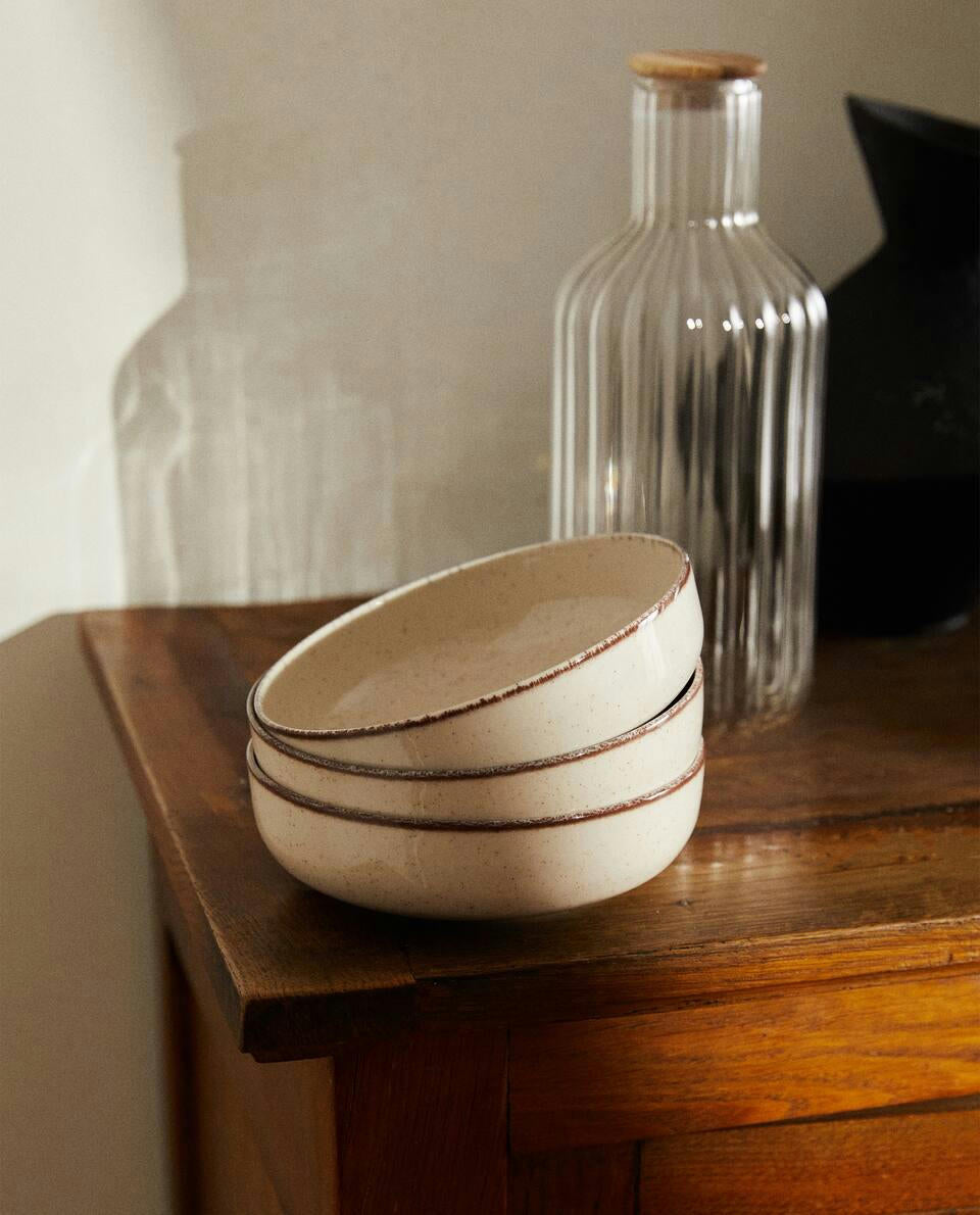 PORCELAIN BOWL WITH ANTIQUE FINISH RIM